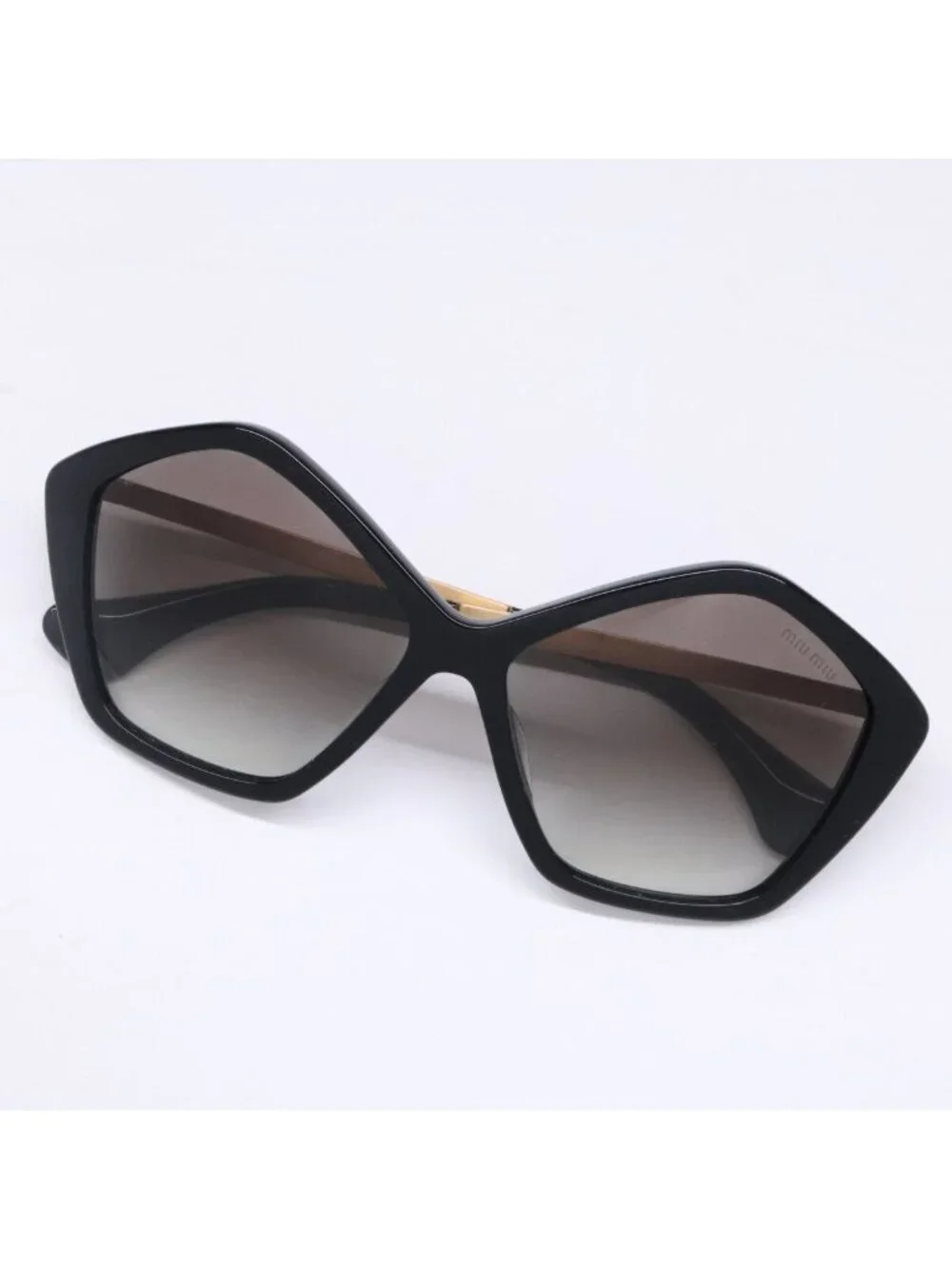 Miu Miu Pentagon Eyewear